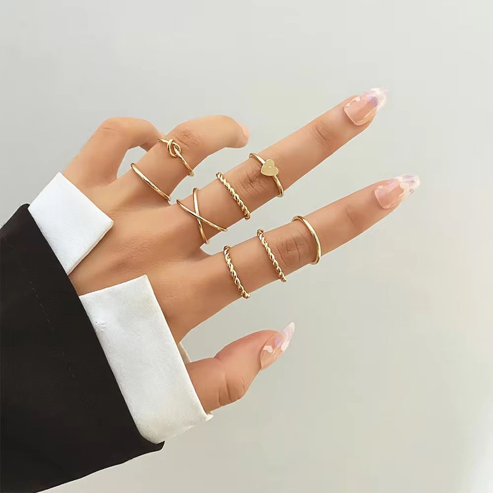 Set Of 8 Thin Layer Knot Rings